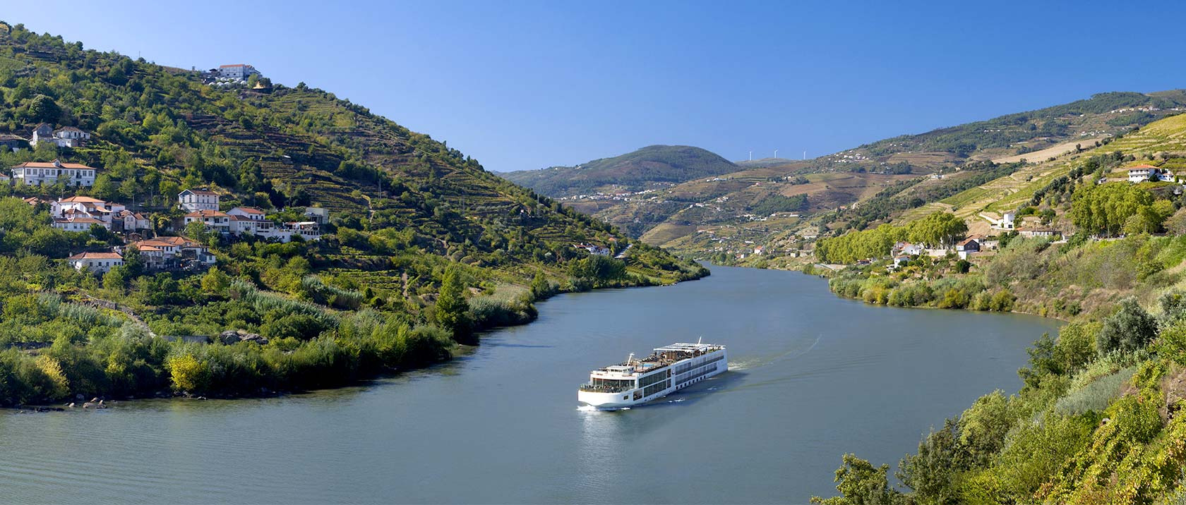A Viking river ship sailing along the Douro River